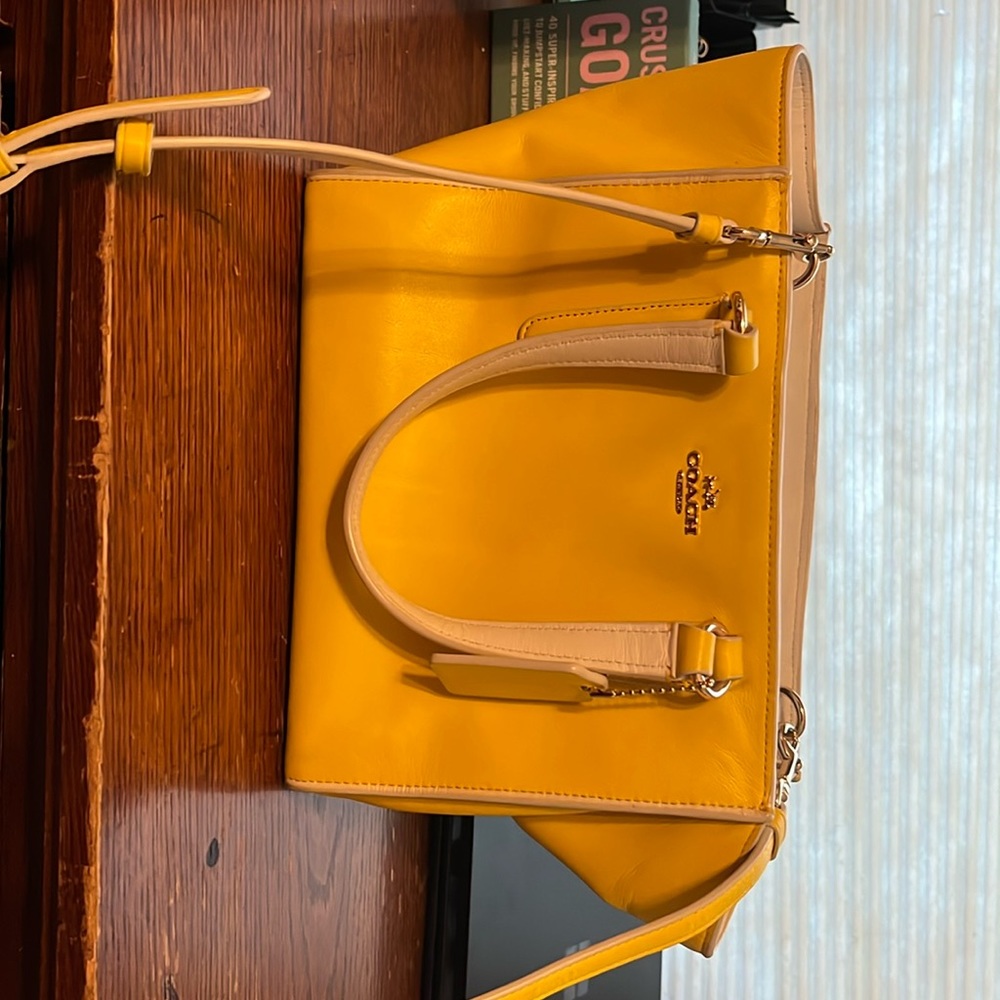 This yellow Coach purse is perfect for spring! Barely used and fabulous!